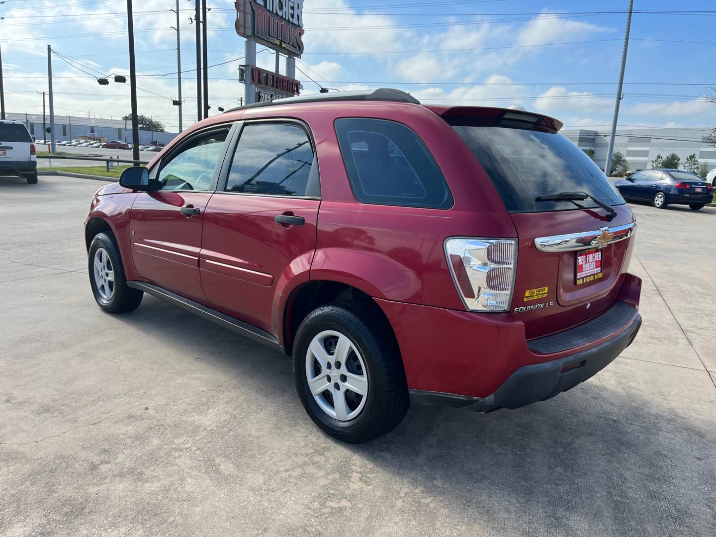 2006 red /TAN Chevrolet Equinox LS 2WD (2CNDL13F366) with an 3.4L V6 OHV 12V engine, 5-Speed Automatic transmission, located at 14700 Tomball Parkway 249, Houston, TX, 77086, (281) 444-2200, 29.928619, -95.504074 - Photo#4